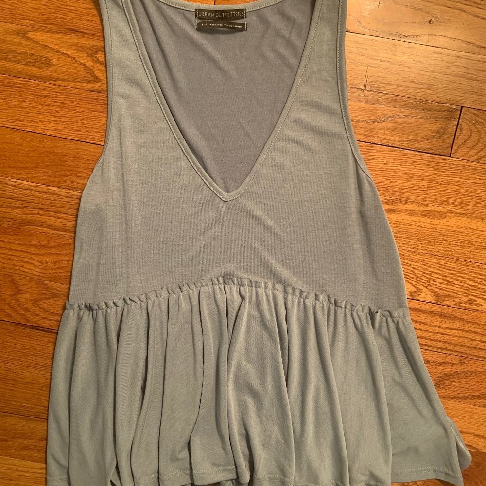Blue tank top with ruffles: Urban Outfitters